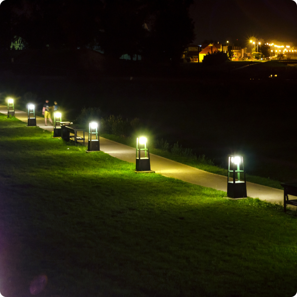 Outdoor landscape lighting illuminating a walkway murrieta california