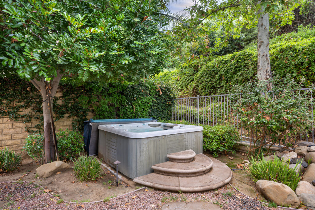 outdoor spa jacuzzi outside surrounded by trees