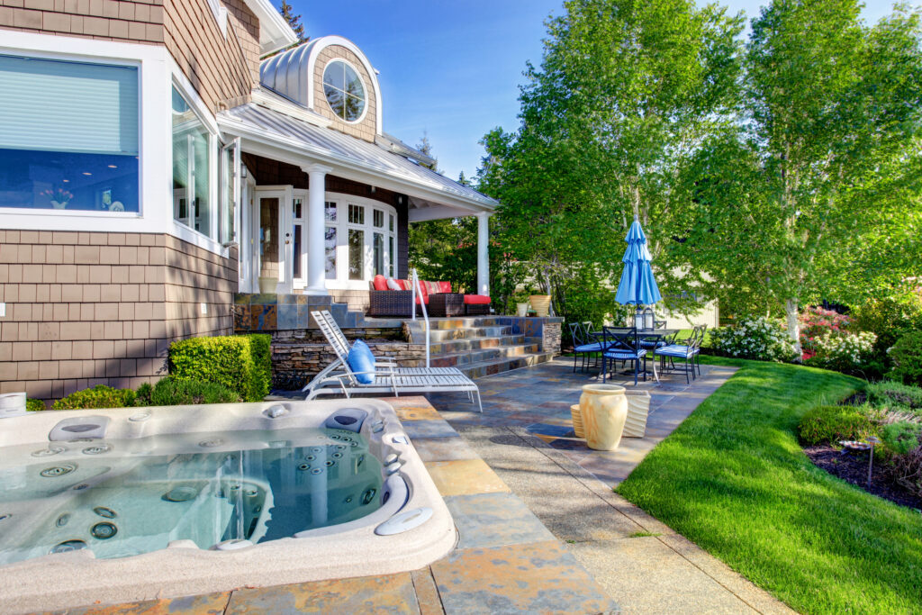 jacuzzi in a backyard on a sunny day