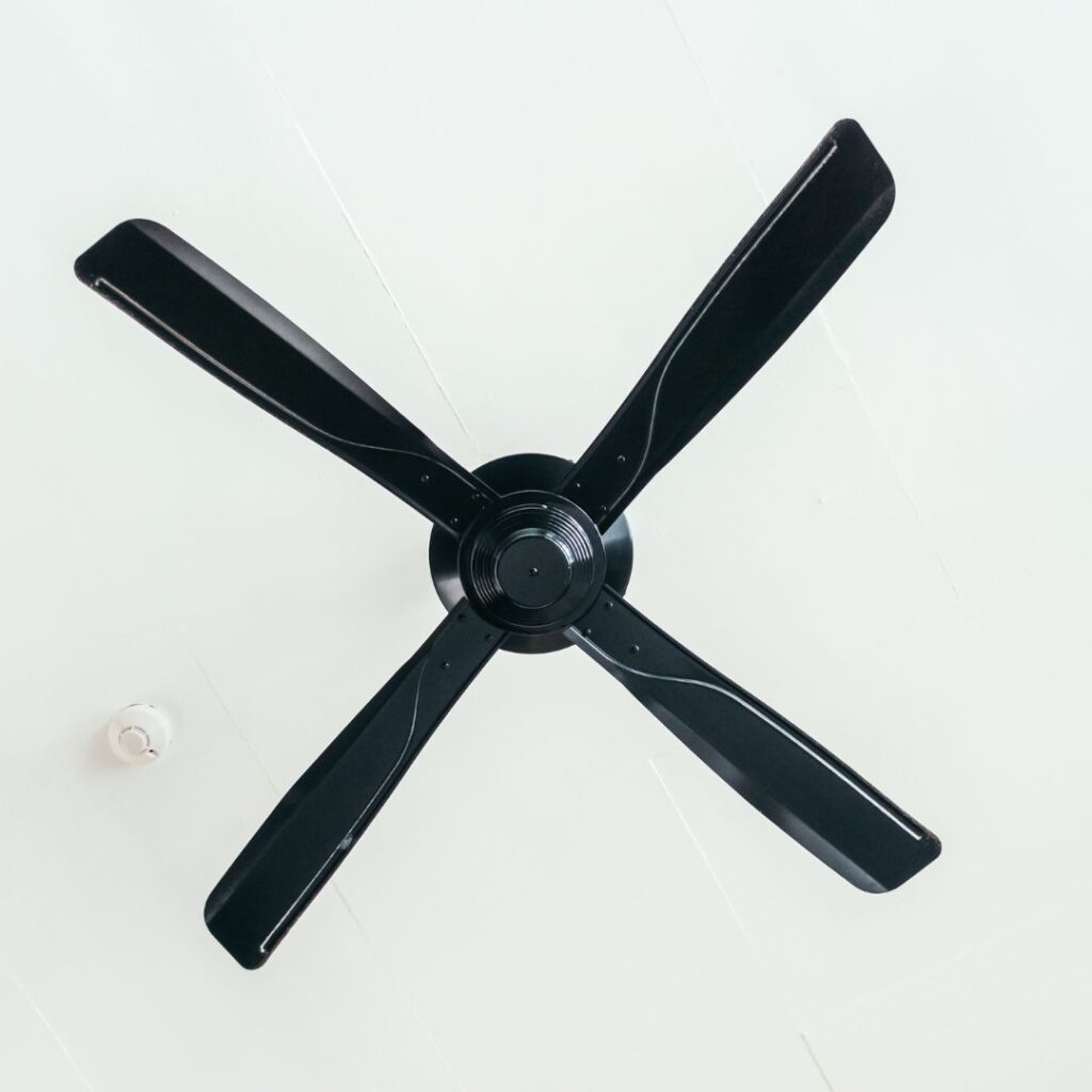 black indoor ceiling fan with 4 blades